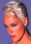 A living phantasm for all men, tall Danish Brigitte Nielsen, 1m85 (6'1) barefoot, is the former wife of Sly Stallone.