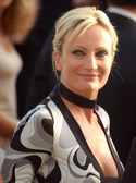 Patricia Kaas, a French singer with an apparent smile, calm, and charm, but with extreme hidden tensions. She has Uranus-Pluto-Moon in the 8th House square Venus and opposite Saturn. But... isn't it an asset for an artist?